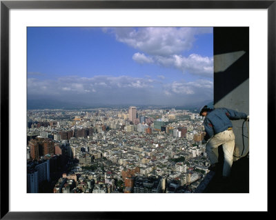 A Construction Worker On A Skyscraper Views Taipeis Cityscape by Jodi Cobb Pricing Limited Edition Print image