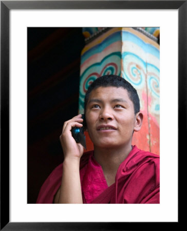 Monk Using Cell Phone In Qiangbalin Temple, Chamdo, Tibet, China by Keren Su Pricing Limited Edition Print image