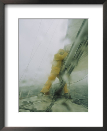 A Sailor Reefs The Boats Mainsail During A Blustery Squall by Skip Brown Pricing Limited Edition Print image