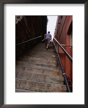 Man Running Up Exorcist Steps At Georgetown University Campus, Washington Dc, Usa by Rick Gerharter Pricing Limited Edition Print image