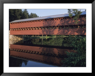 The Sachs Mill Bridge Is Reflected In The Marsh River by Raymond Gehman Pricing Limited Edition Print image