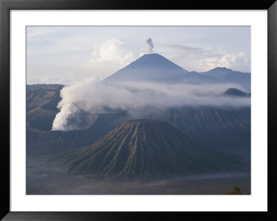 The Peak Of Semaru Rises Above Mount Bromo On The Tengger Caldera by Peter Carsten Pricing Limited Edition Print image