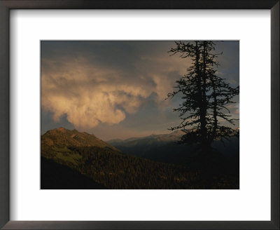 Swirling Clouds Over North Cascades National Park by Annie Griffiths Belt Pricing Limited Edition Print image