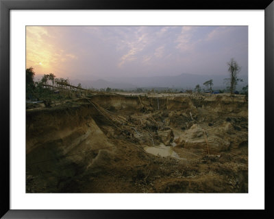 A Muddy Hole In The Earth Where Gold Mining Is Taking Place by Steve Winter Pricing Limited Edition Print image