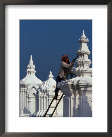 Temple Worker Applies Coat Of Whitewash To 14Th Century Stupa At Wat Suan Dok, Chiang Mai, Thailand by Bill Wassman Pricing Limited Edition Print image