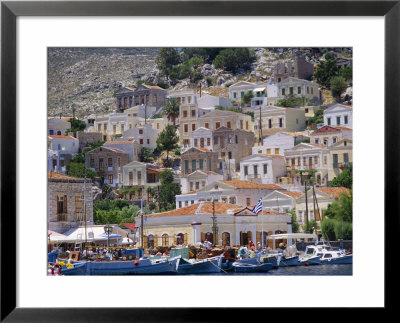 Moored Boats And Waterfront Buildings, Gialos, Symi (Simi), Dodecanese Islands, Greece by G Richardson Pricing Limited Edition Print image