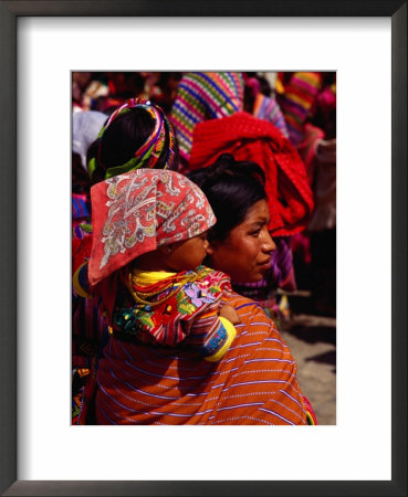 Mother And Baby In Crowd, Zunil, Guatemala by Jeffrey Becom Pricing Limited Edition Print image