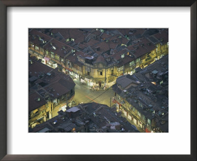 Aerial View Showing An Intersection In The Densely Populated Old Section Of Shanghai by Paul Chesley Pricing Limited Edition Print image
