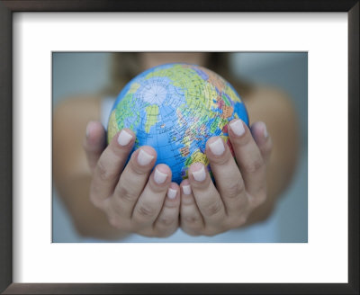 Woman's Hands Holding World Globe by Angelo Cavalli Pricing Limited Edition Print image