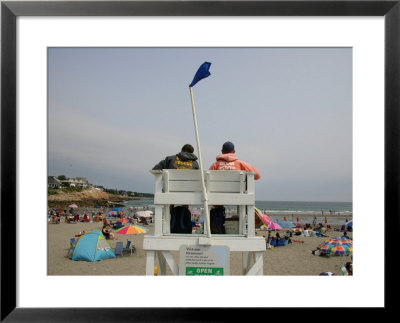 Lifeguards Watch Over The Traditional Tourist Town Beach by Stephen St. John Pricing Limited Edition Print image