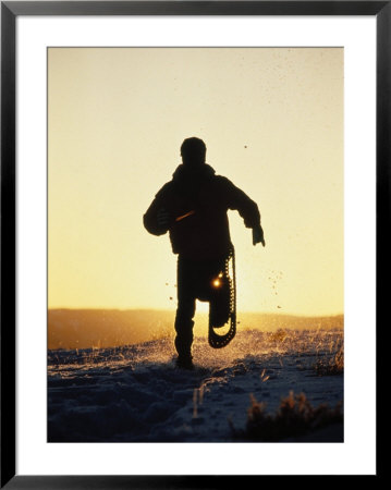 Silhouette Of Person Snowshoeing by Karl Neumann Pricing Limited Edition Print image