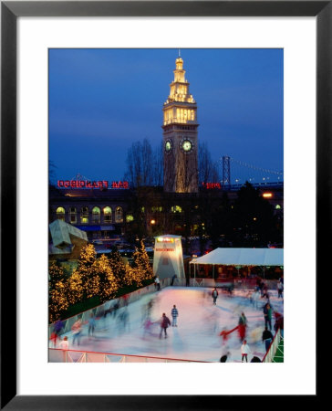 Outdoor Night Ice Skating In Front Of Ferry Building, San Francisco, California, Usa by Curtis Martin Pricing Limited Edition Print image