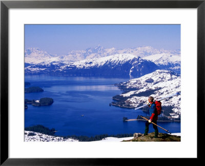 Hiker Overlooking Lake With Mountains In Distance, Prince William Sound, U.S.A. by Mark Newman Pricing Limited Edition Print image