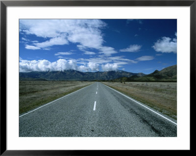 Straight Road Heading Towards Mountains And Clouds by Todd Gipstein Pricing Limited Edition Print image