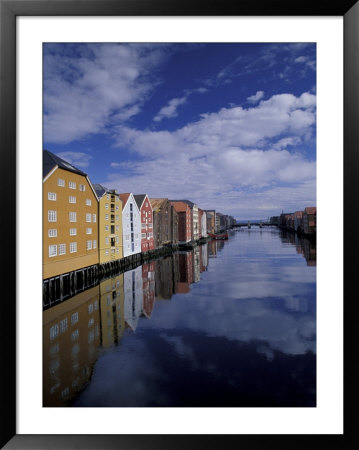 Historic Warehouses In Morning, Trondheim, Norway by Walter Bibikow Pricing Limited Edition Print image