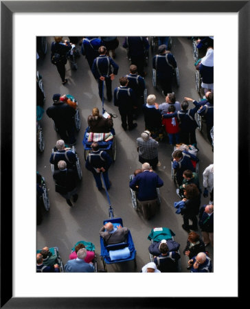 Pilgrims Walking On Esplenade Du Rosaire After Sunday Mass, Lourdes, Midi-Pyrenees, France by Stephen Saks Pricing Limited Edition Print image