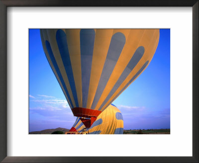 A Hot Air Ballon About To Fly Over The Cappadocia Landscape, Cappadocia, Nevsehir, Turkey by Wes Walker Pricing Limited Edition Print image