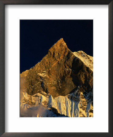 Machhapuchhare's West Face Glowing In The Sunset,Gandaki, Nepal by Anders Blomqvist Pricing Limited Edition Print image