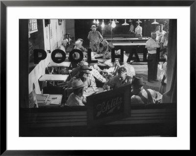 Scene From A Small Town Pool Hall, With People Just Hanging Out And Relaxing by Loomis Dean Pricing Limited Edition Print image