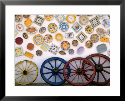 Ceramic Plates And Wagon Wheels, Algarve, Portugal by John & Lisa Merrill Pricing Limited Edition Print image