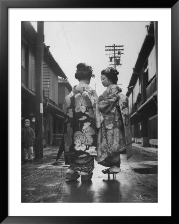 Geisha Girl Chats With Young Novice, Yoko Minami, Who Is Studying To Become A Geisha by Alfred Eisenstaedt Pricing Limited Edition Print image