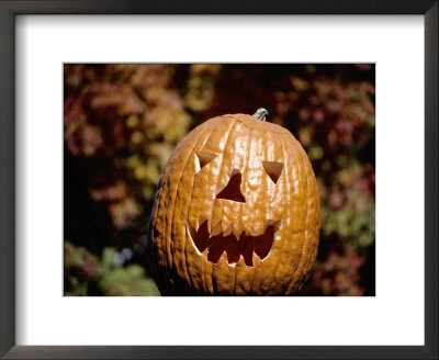 The Toothy Grin Of A Halloween Jack-O-Lantern With Seasonal Backdrop by Stephen St. John Pricing Limited Edition Print image