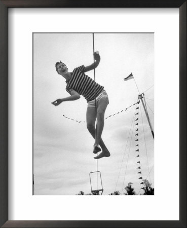 Circus Performer Johnnie Fortune Teetering On Tightwire As He Practices Drunken Clown Routine by Loomis Dean Pricing Limited Edition Print image