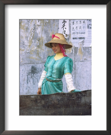 Young Dai Woman Wearing Straw Hat, China by Charles Crust Pricing Limited Edition Print image
