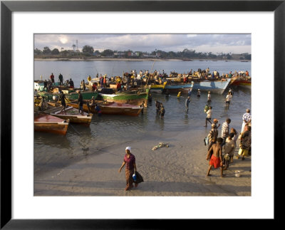 People On Shore Near Fishing Boats, Dar Es Salaam, Tanzania by Ariadne Van Zandbergen Pricing Limited Edition Print image