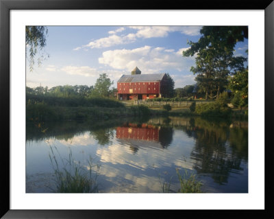 An Old Red Barn Reflected In A Pond by Richard Nowitz Pricing Limited Edition Print image