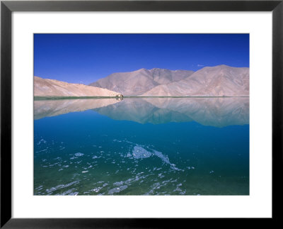 Arid Terrain Reflected In Lake Karakul En Route To Kashgar, Kara Kul, Xinjiang, China by Grant Dixon Pricing Limited Edition Print image