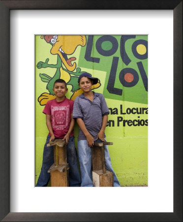 Shoeshine Boys Posing In Front Of Colourful Wall, Esteli, Nicaragua by Margie Politzer Pricing Limited Edition Print image
