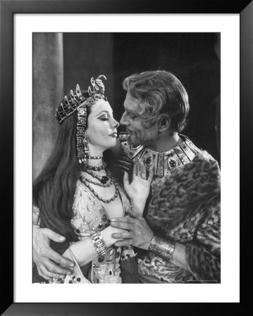 Actress Vivien Leigh As Cleopatra Being Embraced By Husband Laurence Olivier by Cornell Capa Pricing Limited Edition Print image