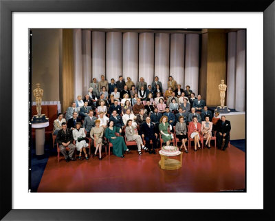 Mgm Head Louis B. Mayer Feting Metro Goldwyn Mayer's 60Th Birthday In A Portrait With Studio Stars by Walter Sanders Pricing Limited Edition Print image