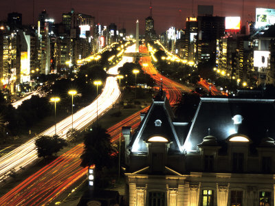 City Lights On French Consulate & Avenida 9 De Julio With Obelisk, Buenos Aires, Argentina by Holger Leue Pricing Limited Edition Print image