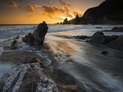 Jagged Rocks At Westcombe Bay, Devon, England by Adam Burton Pricing Limited Edition Print image