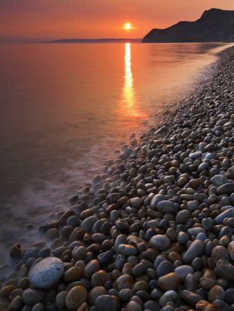Sunset Over The Pebbly Shore At Eype, Jurassic Coast World Heritage Site, Dorset by Adam Burton Pricing Limited Edition Print image