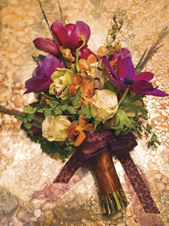 Flower Arrangement On Gold-Colored Table by Images Monsoon Pricing Limited Edition Print image