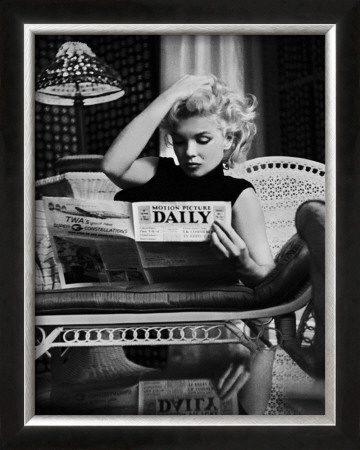 Marilyn Monroe Reading Motion Picture Daily, New York, C.1955 by Ed Feingersh Pricing Limited Edition Print image
