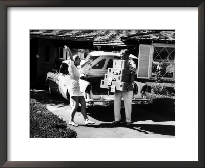 Teenager Receiving New Luggage From Her Father by Yale Joel Pricing Limited Edition Print image