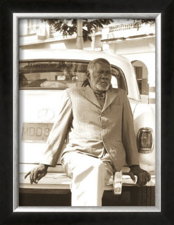 Man Sitting On Car by Nelson Figueredo Pricing Limited Edition Print image