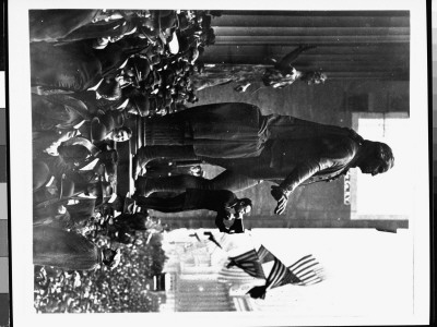 Actor Douglas Fairbanks Speaks To Crowd Through Megaphone Near Large Statue Of George Washington by Paul Thompson Pricing Limited Edition Print image