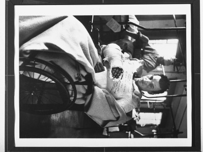 Encased In Plaster Cast For His Body And Arms, Fractured By Shrapnel During Combat In France by Ralph Morse Pricing Limited Edition Print image