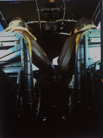 Pilots Wearing Us Military Leather Flight Suits And Oxygen Masks Talking In Plane Cockpit by Dmitri Kessel Pricing Limited Edition Print image