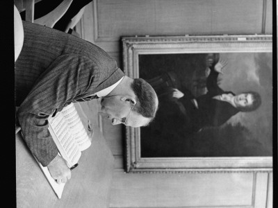 Man Studying Musical Scroe In Music Section Of The New York Public Library by Alfred Eisenstaedt Pricing Limited Edition Print image