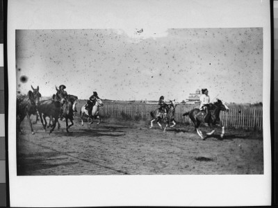 Cowboys And Indians On Horseback During Buffalo Bill's Wild West Show by Wallace G. Levison Pricing Limited Edition Print image