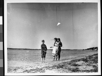 Three Young Girls In Bathing Suits Wading In The Shore by Wallace G. Levison Pricing Limited Edition Print image