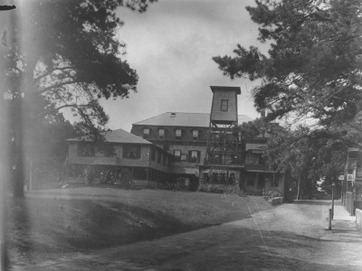 A Large Country Inn Next To A Dirt Road by Wallace G. Levison Pricing Limited Edition Print image