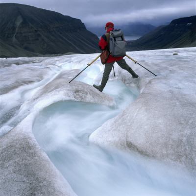 Mountaineer Standing Over A Brook by Ove Eriksson Pricing Limited Edition Print image