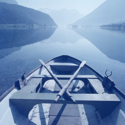 A Rowboat On A Still Lake, Norway by Mikael Bertmar Pricing Limited Edition Print image